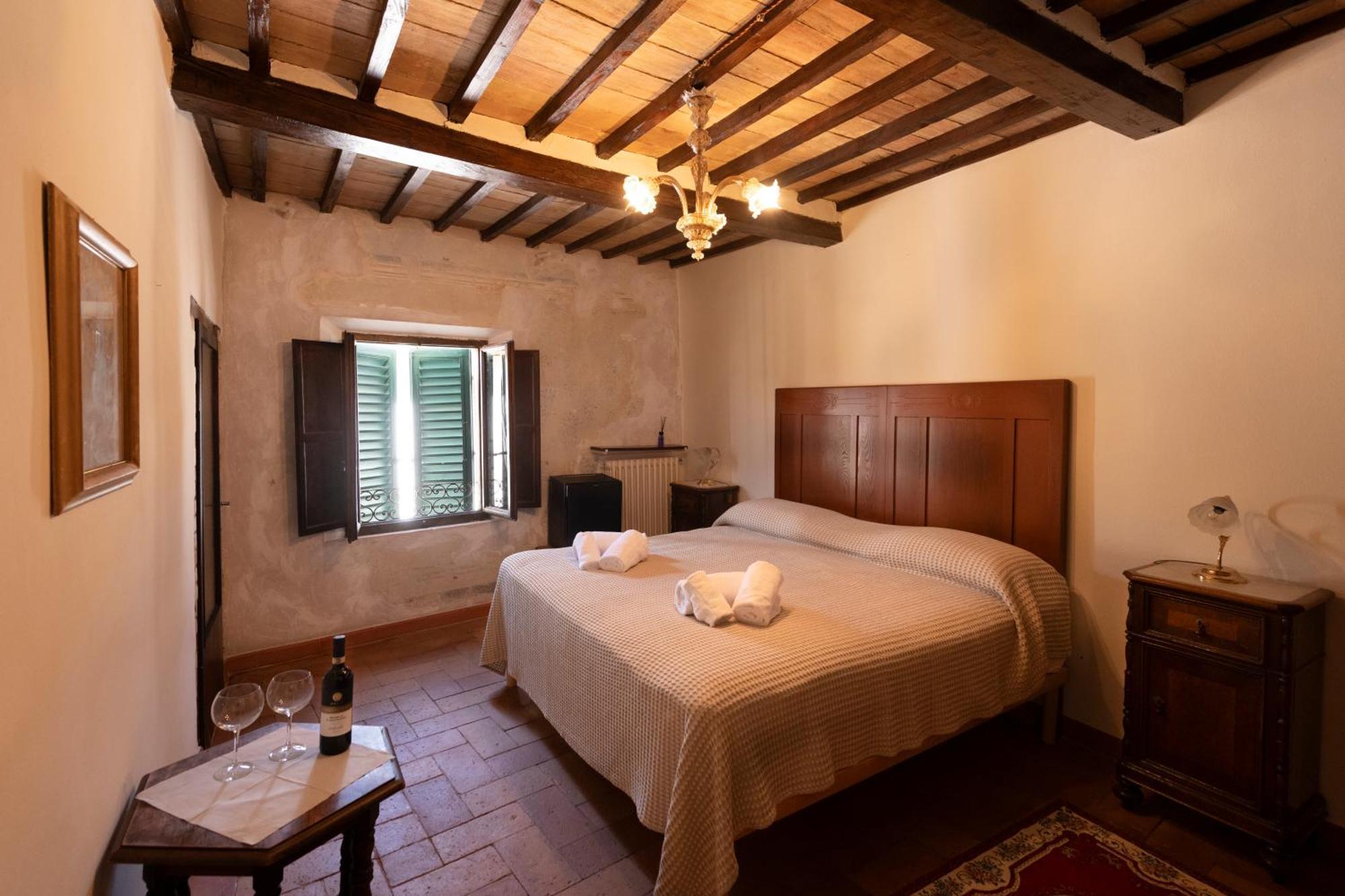 Bed and Breakfast Il Palazzo Del Cardinale à Montalcino Extérieur photo