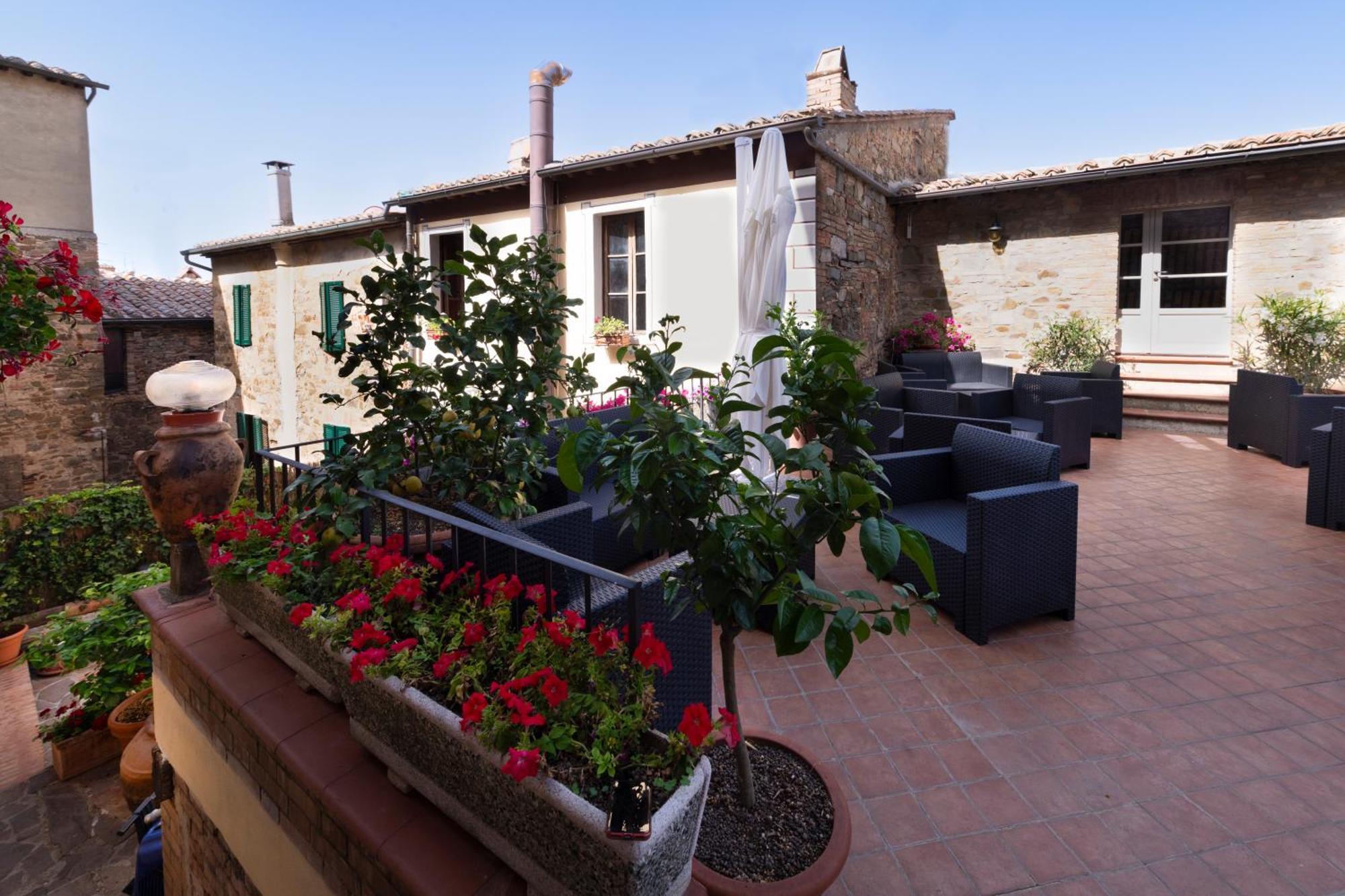 Bed and Breakfast Il Palazzo Del Cardinale à Montalcino Extérieur photo